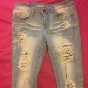 Blue ripped up jeans